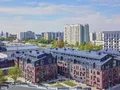 В рамках проекта проекта возведены кирпичные корпуса высотой от 3 до 5 этажей.