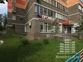 Салон отопительной техники расположен на первом этаже комплекса. Фото от 21.08.2014 г.