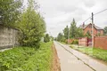 Дорога в поселке Абрамцево, ведущая к новостройке.