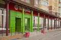 На первых этажах размещены придомовые магазины.