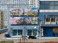 На первом этаже «Аэробуса» расположены коммерческие помещения. Фото от 28.04.2015 г.