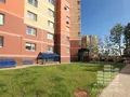 Благоустроенная территория одного из корпусов ЖК «Жемчужина Виктории». Фото от 03.07.2014 г.