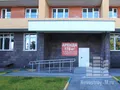 В доме сдаются нежилые коммерческие помещения. Фото от 18.08.2014 г.