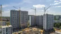 Ход строительства. Монтаж верхних этажей 1 корпуса. Отделка фасада и внутренние работы 2 корпуса. Аэрофотосъемка от 20.06.19 г.