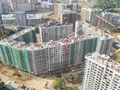 Корпуса 12 дома. Ведутся работы по отделке фасадов. Аэрофотосъёмка от 29.06.18 г.