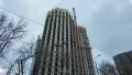 Ход строительства. Монтаж верхних этажей и отделка фасадов. Фото от 14.12.2025 г.