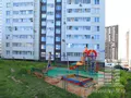 Детская площадка рядом с одним из домов. Фото от 13.07.2014 г.