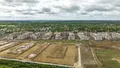 Общий вид новостройки. Ведется активное строительство. Аэрофотосъемка 15.06.2022 г.