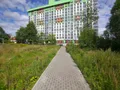 ЖК «Архимед» построен по индивидуальному проекту и представляет собой новостройку переменной этажности (14-16 этажей). Фото от 19.08.2015 г.