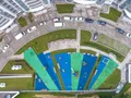 ЖК «Панорама Сколково». Детская площадка и придомовая парковка. Вид сверху. Аэрофотосъемка. Фото от 18.07.2017 г.