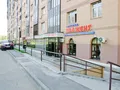 Инфраструктурные объекты на нижних этажах домов. Фото от 05.05.2015 г.