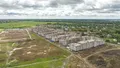 Первая очередь строительства. Ход строительства. Возводятся верхние этажи. Аэрофотосъемка 15.06.2022 г.