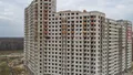 Выполняется кирпичная кладка ограждений переходных балконов 12эт. на секциях №6,8 12этажа. Аэрофотосъёмка 21.10.2019 г.