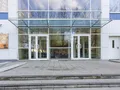 В здании комплекса расположен бизнес-центр «Авиатор». Фото от 28.04.2015 г.