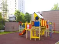 ЖК на ул. Дыбенко, корп. 1, вл. 38. Детская игровая площадка. Фото от 09.07.2016 г.