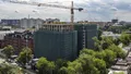 Фото от 24.07.2020. Начаты работы по устройству кровли здания и по подготовке демонтажа башенного крана.